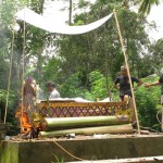 Cremation ceremony in Lombok, bed set on fire